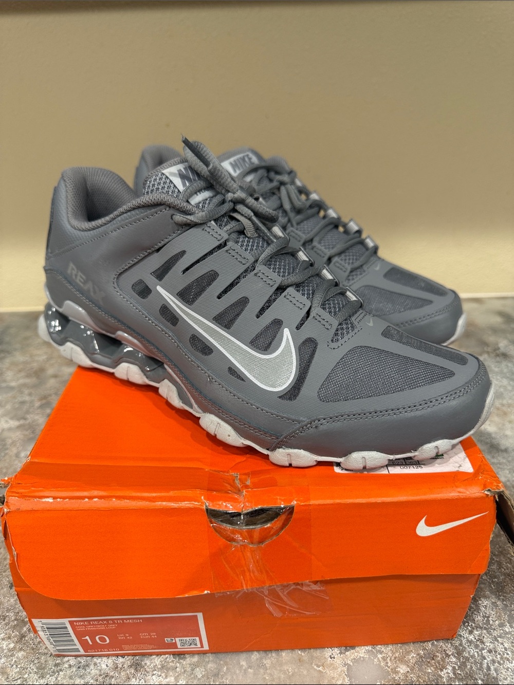 Nike Men’s Grey Athletic Shoes with Silver Swoosh